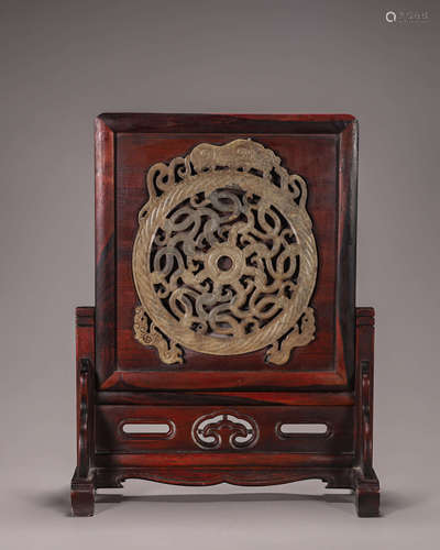 A rosewood jade-inlaid dragon screen