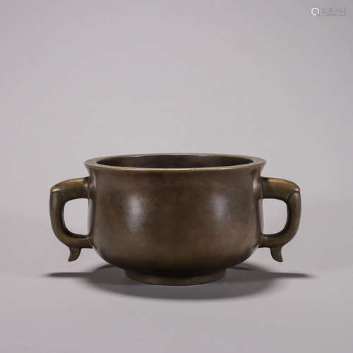 A copper censer with dragon-shaped ears