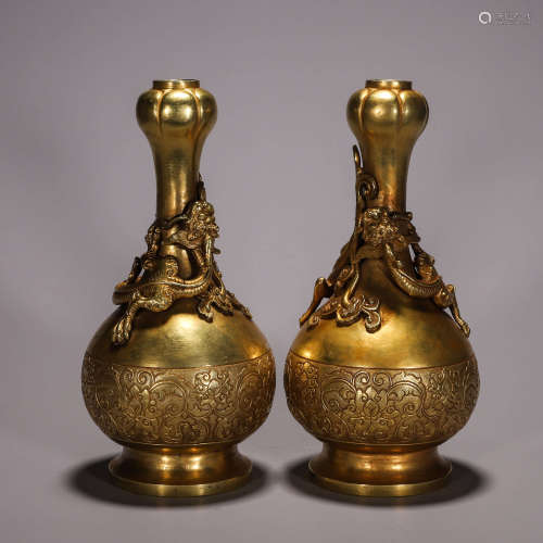 A pair of gilding copper dragon vases