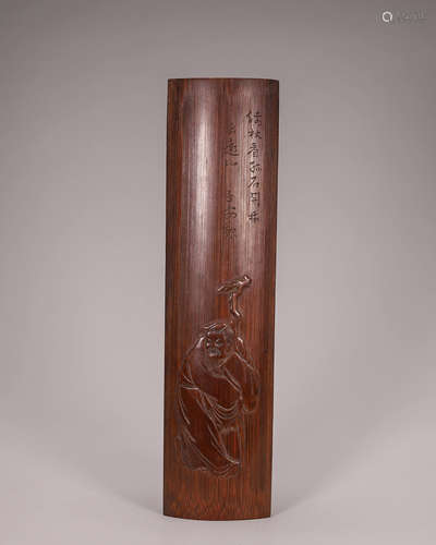 A figure carved bamboo arm rest