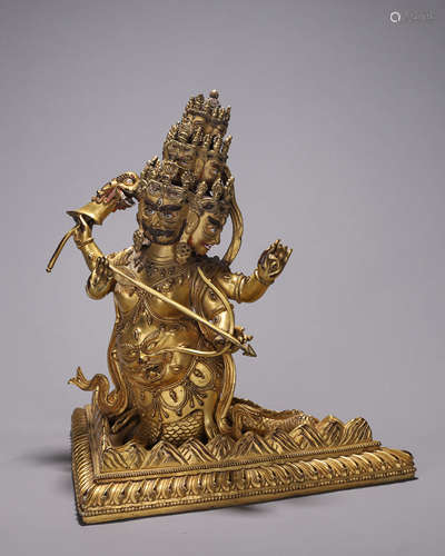 A gilding copper buddha statue