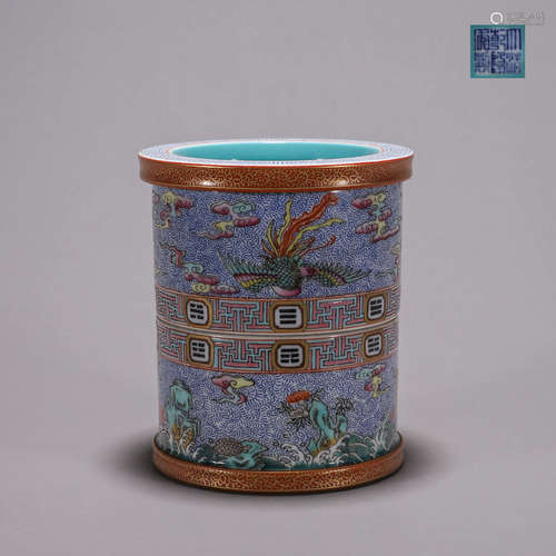 A blue and white phoenix bird and bagua porcelain brush pot