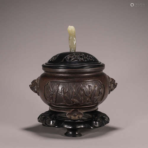 A copper jade-inlaid censer with lion head-shaped ears