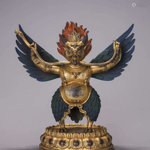 A copper Garuda statue