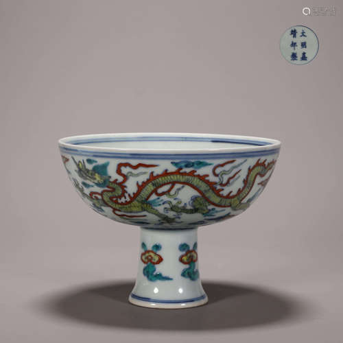 A doucai cloud and dragon porcelain stem cup