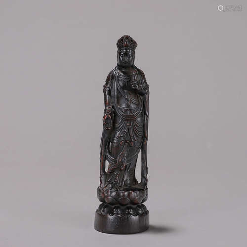 An aloeswood Guanyin bodhisattva statuette