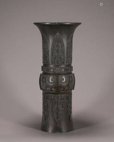 A taotie patterned bronze beaker vase