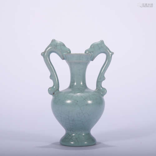 A celadon-glazed vase