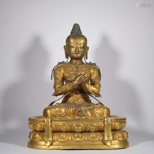 A gilt-bronze statue of Sakyamumi