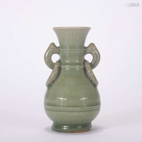 A celadon-glazed vase