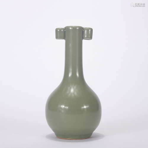 A celadon-glazed vase