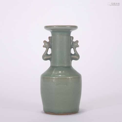 A celadon-glazed vase