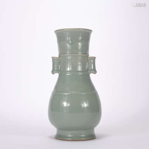 A celadon-glazed vase