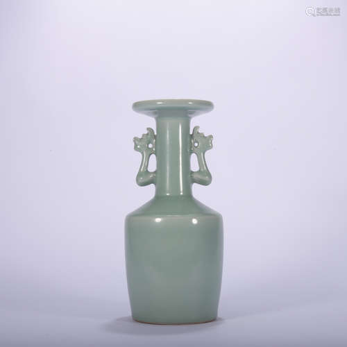 A celadon-glazed vase