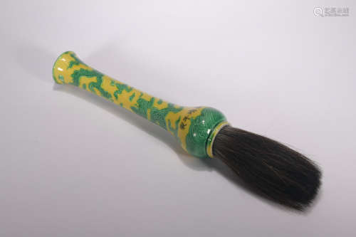 A yellow ground green glazed 'dragon' writing brush
