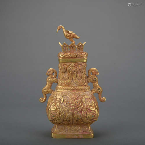 A gold 'beast' winepot