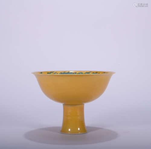 A yellow glazed stem bowl