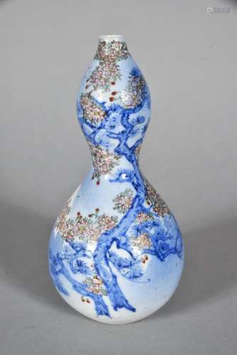 Vase en forme de coloquinte, en porcelaine polychrome de pru...