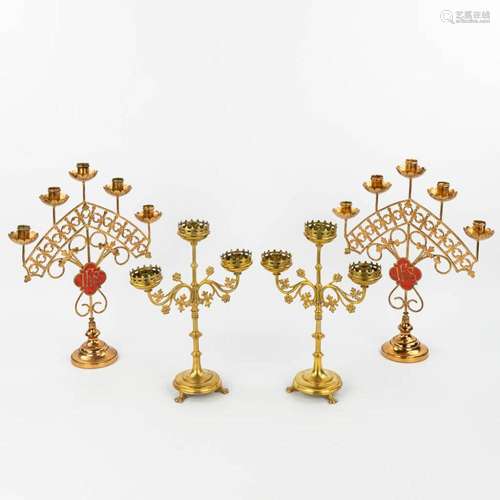 A collection of 2 pairs of candlesticks in neogothic style. ...