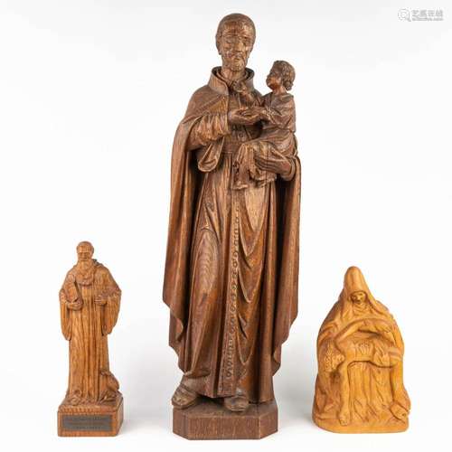 A collection of 3 statues of holy figurines made of sculptur...