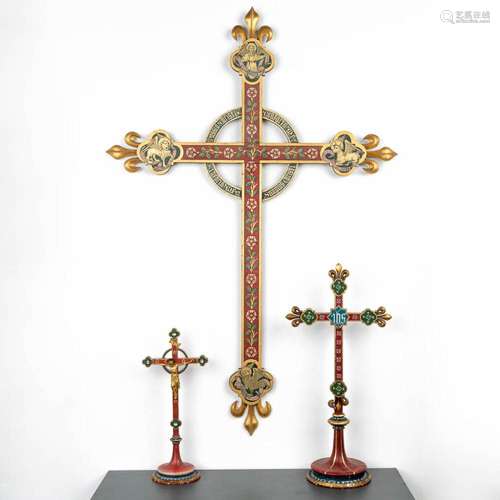 A collection of 3 polychrome gothic revival style crucifixes...