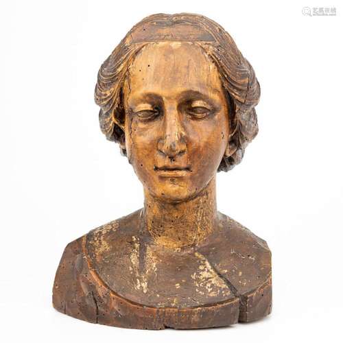 An antique wood sculptured bust, probably of a procession Ma...