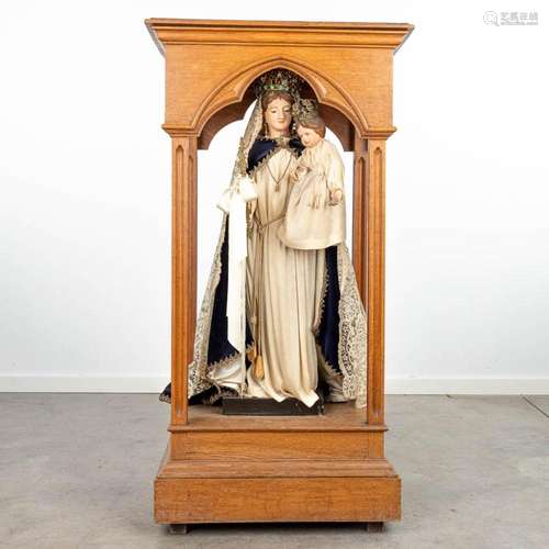 A statue of 'Our Lady' Madonna with child in a shrin...