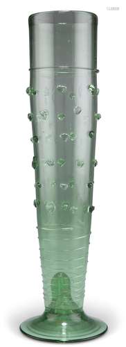 A TALL GREEN GLASS VASE, CIRCA 1870, the slightly tapering b...