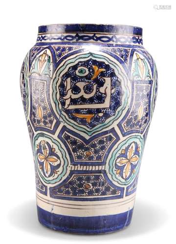 A PERSIAN LARGE TIN-GLAZED EARTHENWARE VASE, 19TH CENTURY, o...