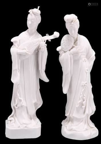 TWO CHINESE BLANC DE CHINE PORCELAIN FIGURES OF COURTESANS, ...