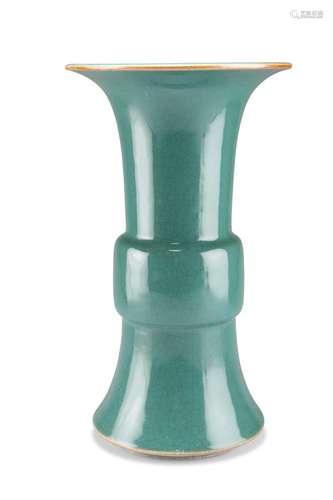 A CHINESE MONOCHROME GU VASE, with green crackle glaze. 34.5...