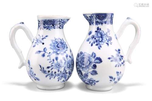 TWO 18TH CENTURY CHINESE BLUE AND WHITE CREAM JUGS, each wit...