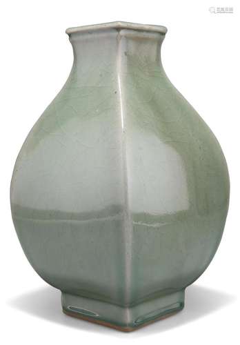 A CHINESE CELADON VASE, of square-section baluster form. 27c...