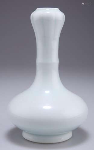 A CHINESE WHITE-GLAZED GARLIC-MOUTH VASE, bottle-shaped, 16c...