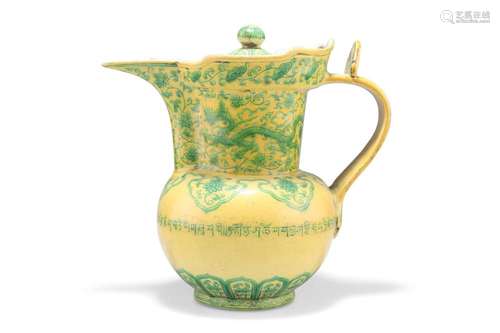 A CHINESE MING-STYLE YELLOW-GLAZED 'MONKS CAP' EWER,...