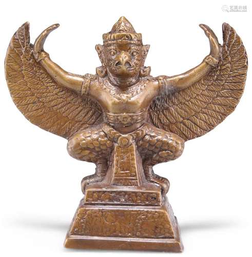 A THAI PATINATED METAL FIGURE OF GARUDA, in a squatting post...