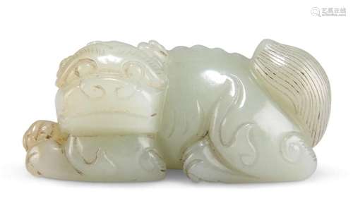 A CHINESE JADE CARVING, of a recumbent foo dog. 3.5cm by 7cm...