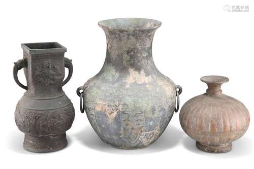 A GROUP OF THREE VASES/VESSELS, the first, Chinese bronze in...