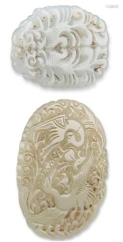 TWO CHINESE CARVED AND PIERCED JADE PENDANT PLAQUES, one dep...