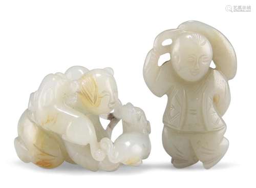 TWO CHINESE JADE CARVINGS, one depicting a child playing wit...