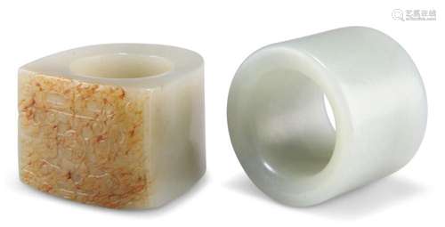 TWO CHINESE JADE ARCHERY THUMB RINGS, one of D-section, the ...