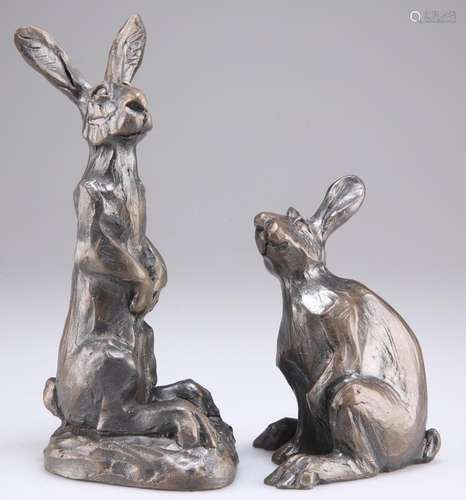 JULIA HULME, A PAIR OF BRONZED MODELS OF HARES, one sitting,...