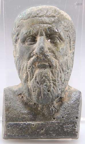 AN ANCIENT ROMAN BRONZE BUST OF A SENATORIAL FIGURE, the bea...