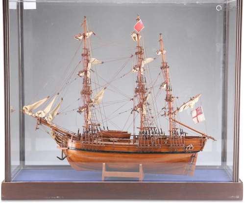 A WOODEN SCALE MODEL OF HMS BOUNTY, with deck fittings, sail...