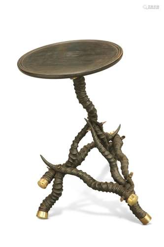 A BLACKBUCK HORN TABLE, CIRCA 1900, the dished circular top ...