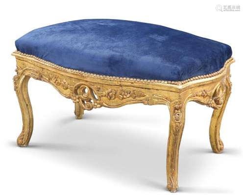 A LARGE PERIOD-STYLE GILT AND UPHOLSTERED STOOL, shaped rect...