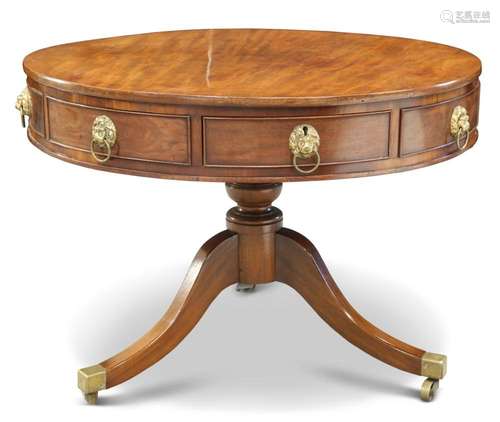 A GEORGE III MAHOGANY DRUM TABLE, the circular top with four...