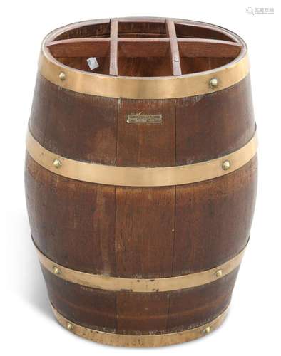 AN EARLY 20TH CENTURY COPPER-BOUND TEAK BARREL-FORM STICKSTA...