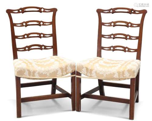 A PAIR OF GEORGE III-STYLE MAHOGANY LADDER-BACK CHAIRS, each...