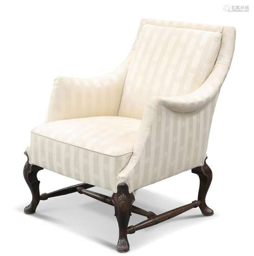 AN EARLY 20TH CENTURY WALNUT AND UPHOLSTERED ARMCHAIR, with ...